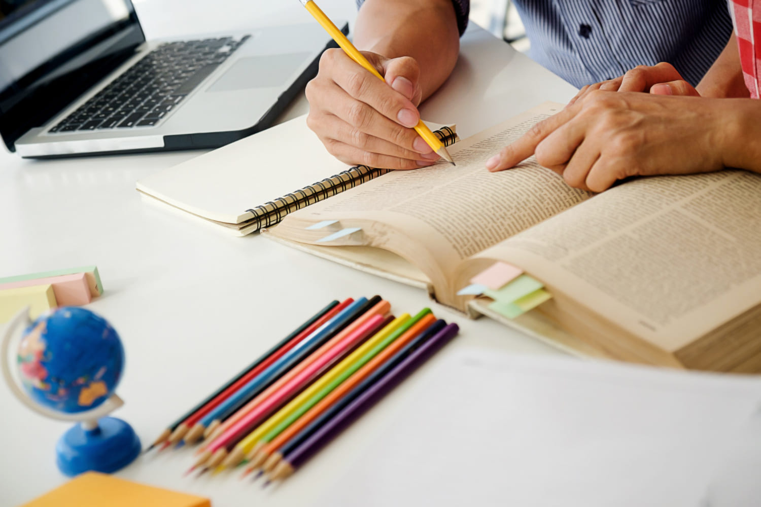 Young students studying together.