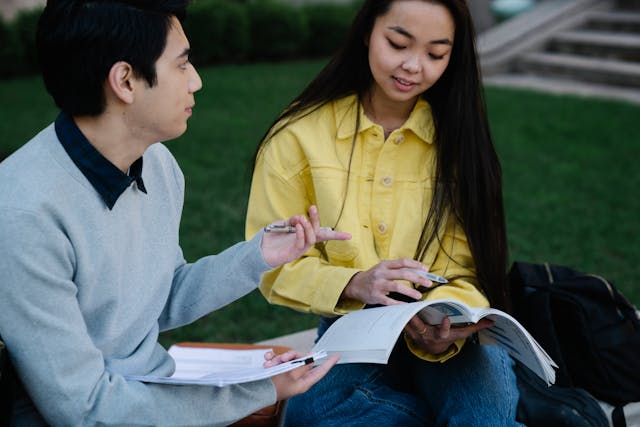 male-female-student-in-park