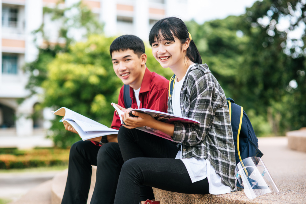 male-female-student-stairs